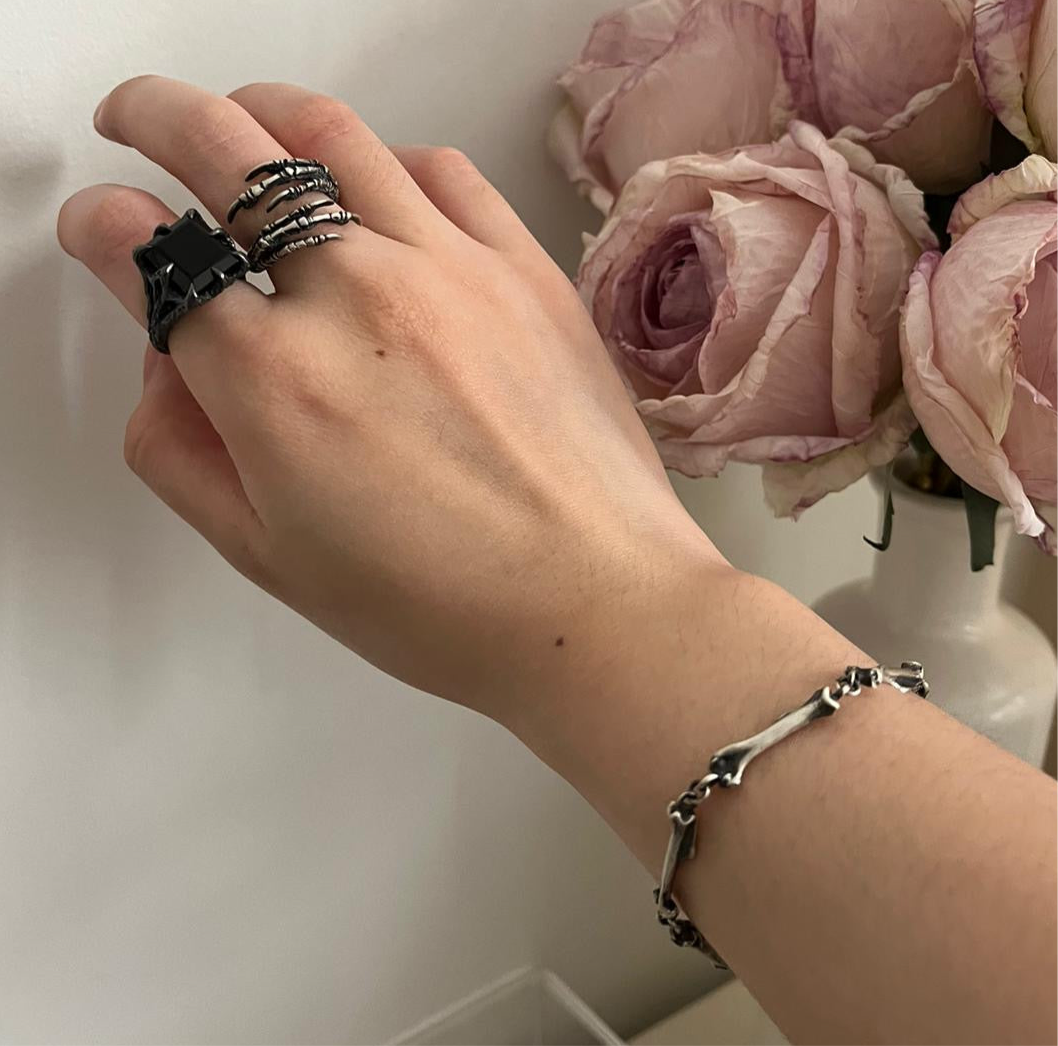 The Dark Embrace Ring - (Garnet and Onyx versions)