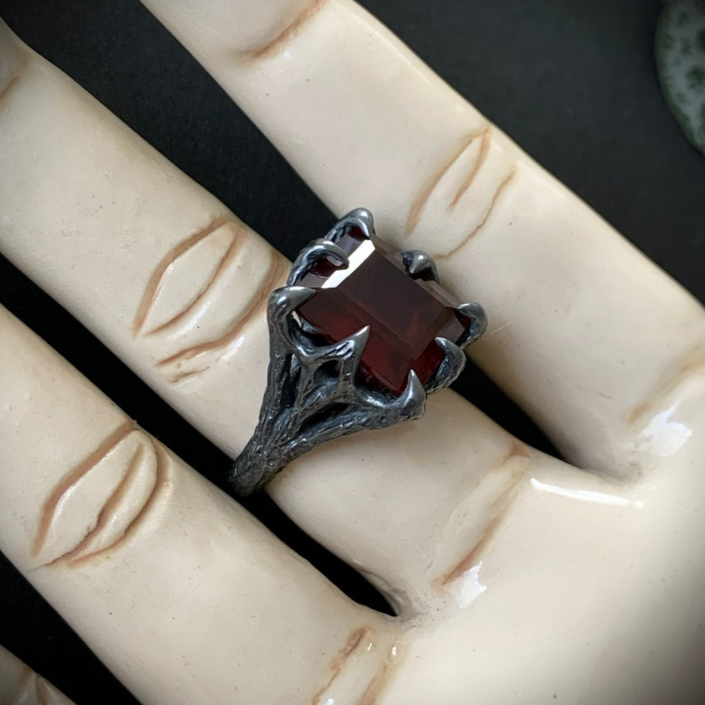 The Dark Embrace Ring Garnet and Onyx versions LSD Jewellery
