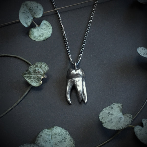 Toothache Pendant